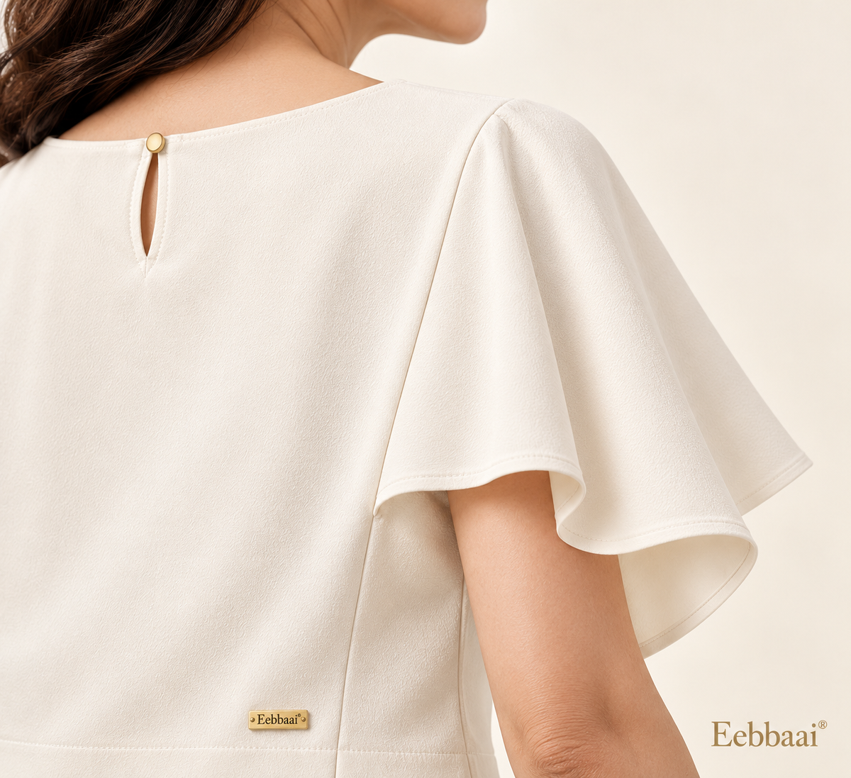 Eebbaai® Pearl Cape-Sleeve Crepe Blouse — Fabric and brand detail